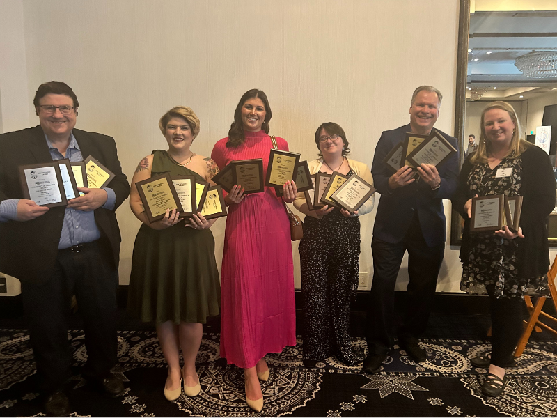 Six people hold awards